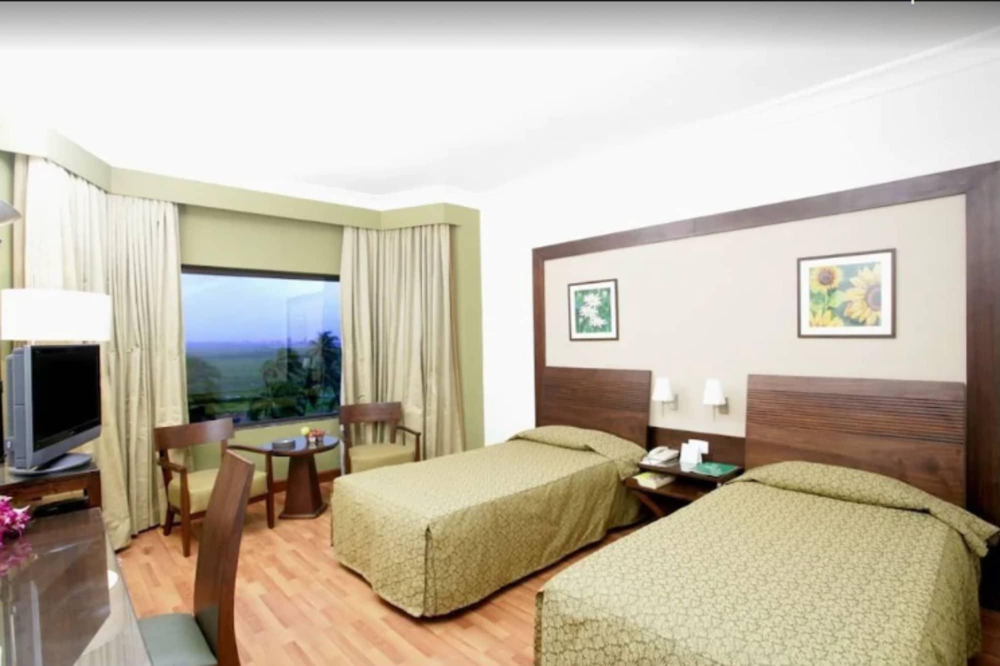 The Retreat Hotel & Convention Centre Mumbai Quarto foto